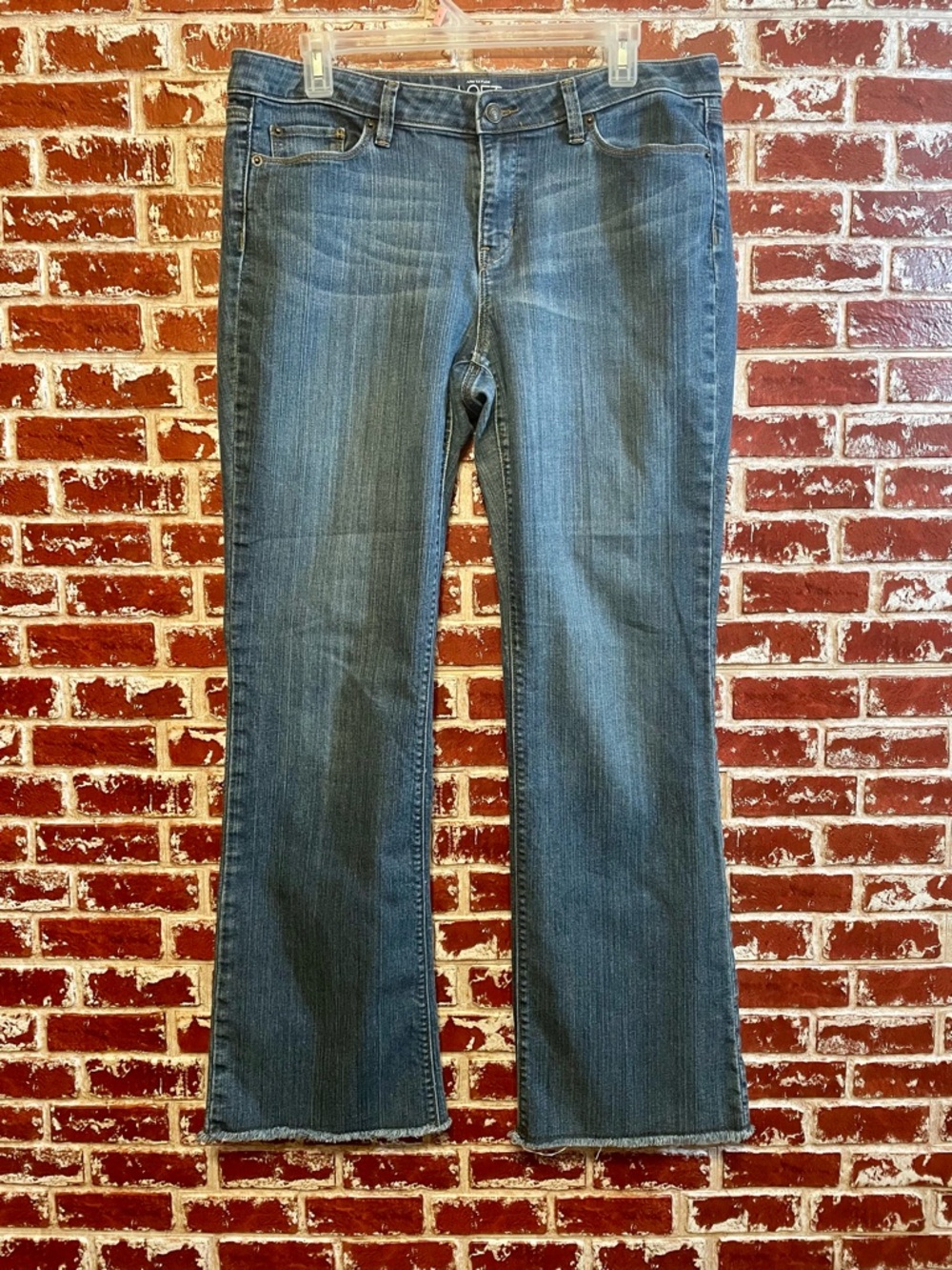 Ann Taylor Loft Original Bootcut Jeans Mid Rise Raw Hem Medium Wash. size 12.